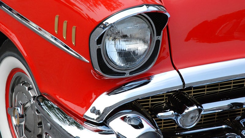 A classic car with red paint