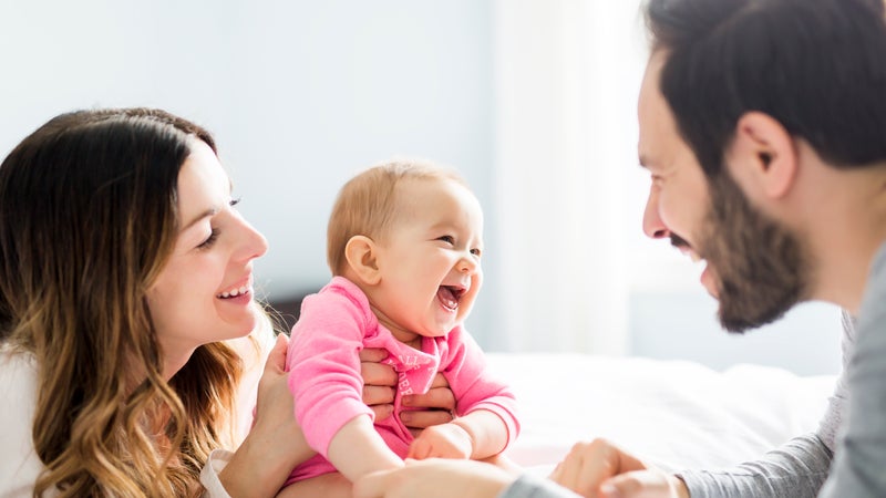 Baby and parents at home