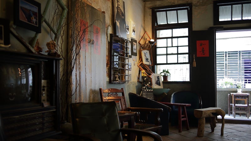 a room filled with antique furniture