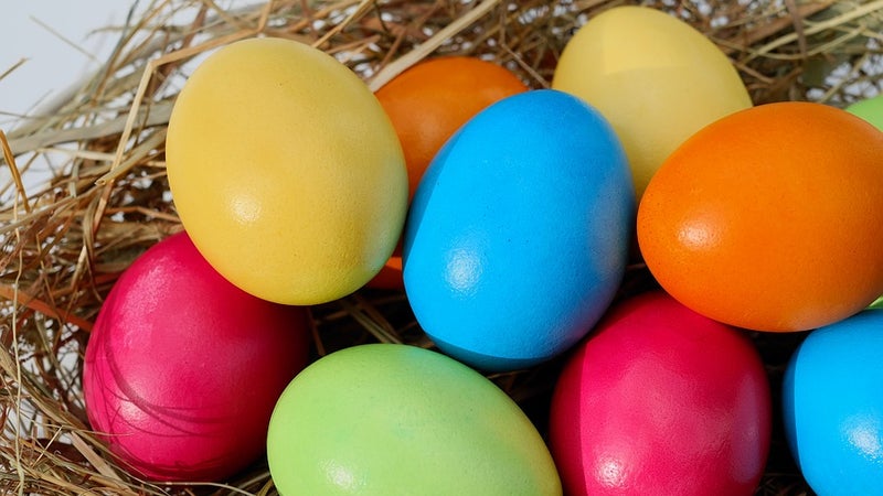 Multicolored Easter eggs in a basket