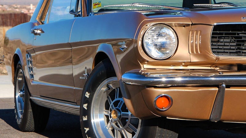 A vintage brown ford car