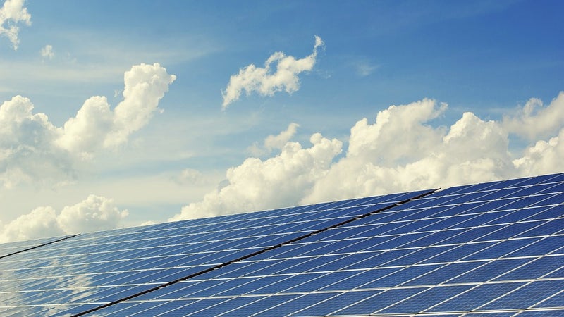 Solar panels with the sky in the background